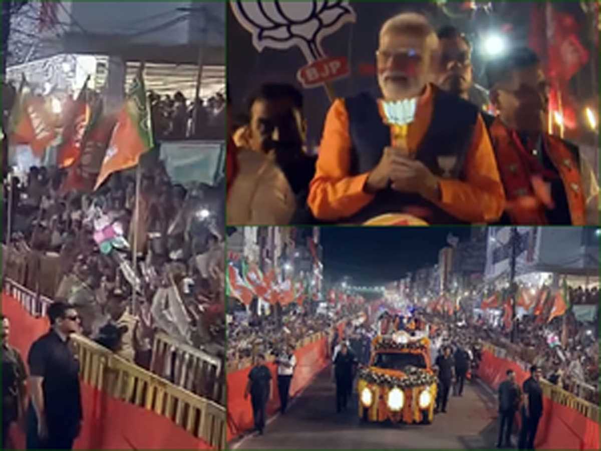 जबलपुर में रोड शो के दौरान पीएम मोदी हाथ में लिए रहे कमल का फूल